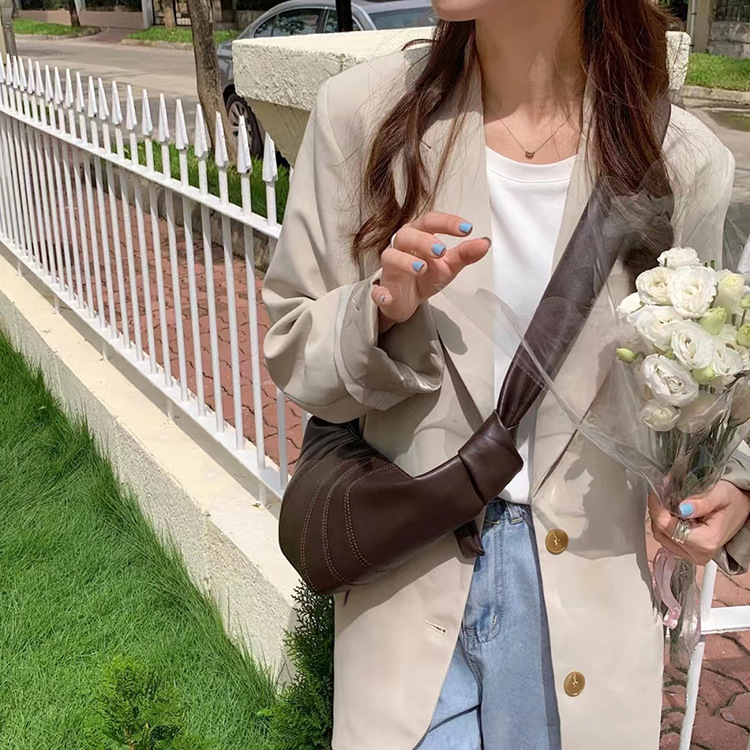 真皮手提牛角饺子单肩包 经典热销柔软牛角包可颂法棍斜挎包软包