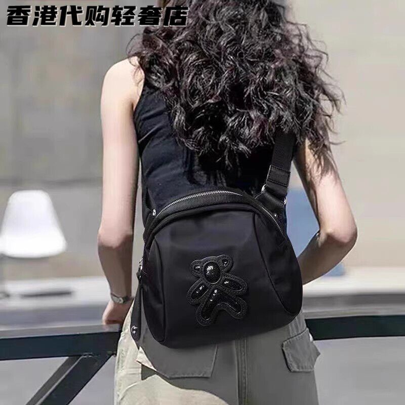 法国ZAMP轻奢时尚贝壳包女潮牌轻便斜挎包百搭单肩包迷你手机包