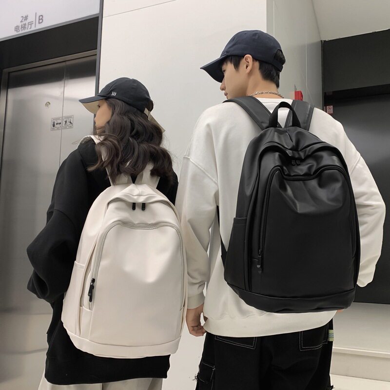 法国MKCLACK校园大学生软皮潮流书包男防泼水大容量简约双肩包女
