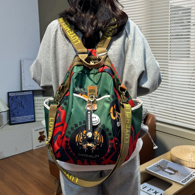 双肩包女2025新款多用休闲女背包旅行包小书包牛津布印花通勤包