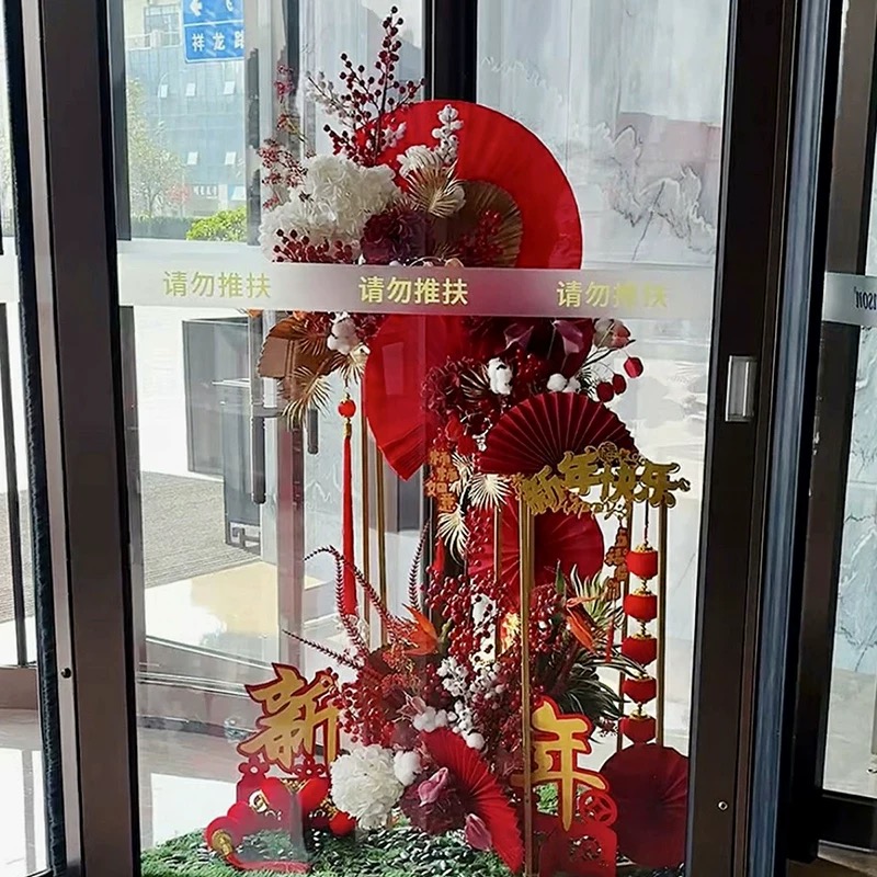 新年酒店旋转门仿真花假花定制喜庆红色过年装饰花大堂大厅摆件