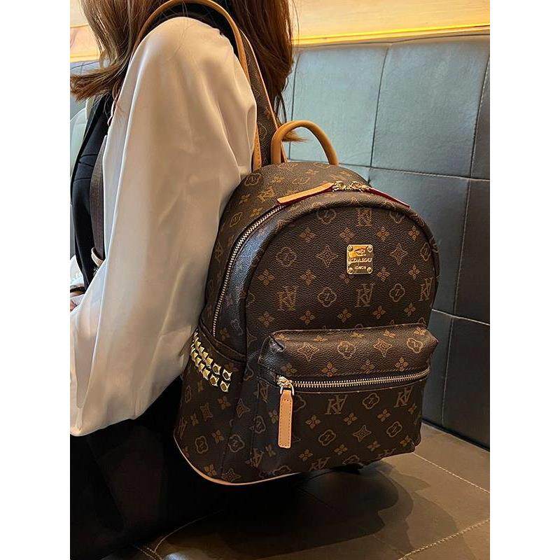 真皮双肩包女2026新款时尚轻便旅游复古老花大牌书包高级休闲背包