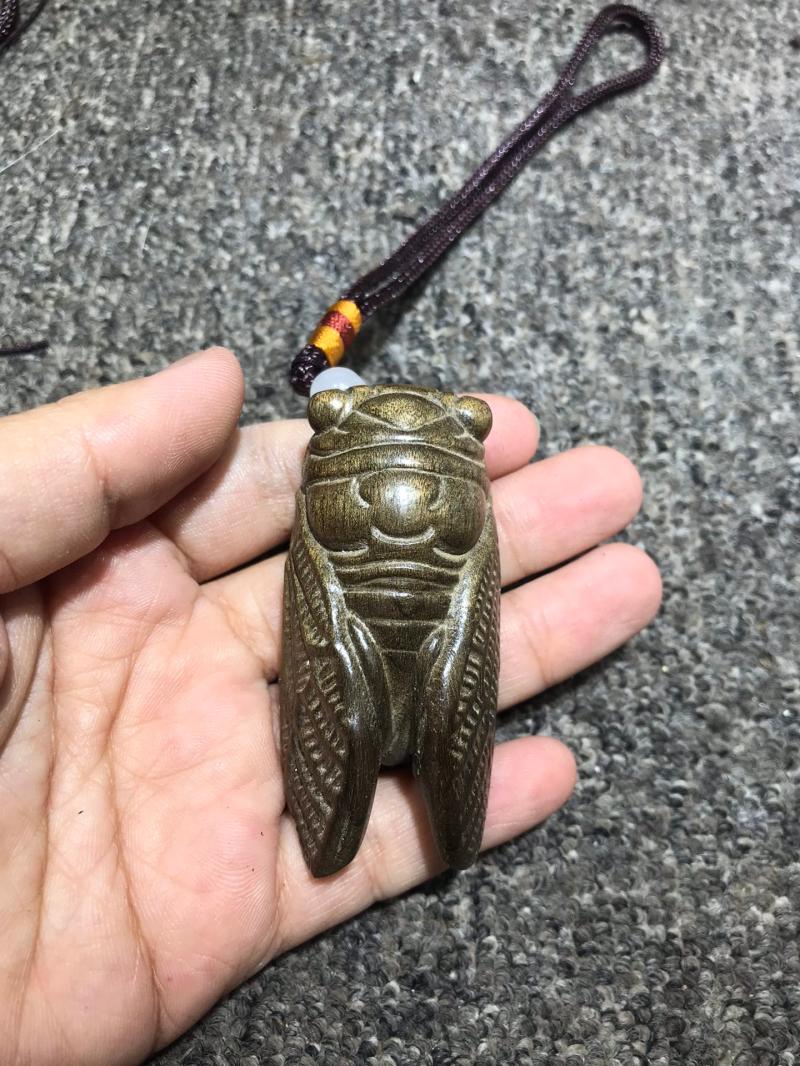 圆雕阴沉木一鸣惊人木雕