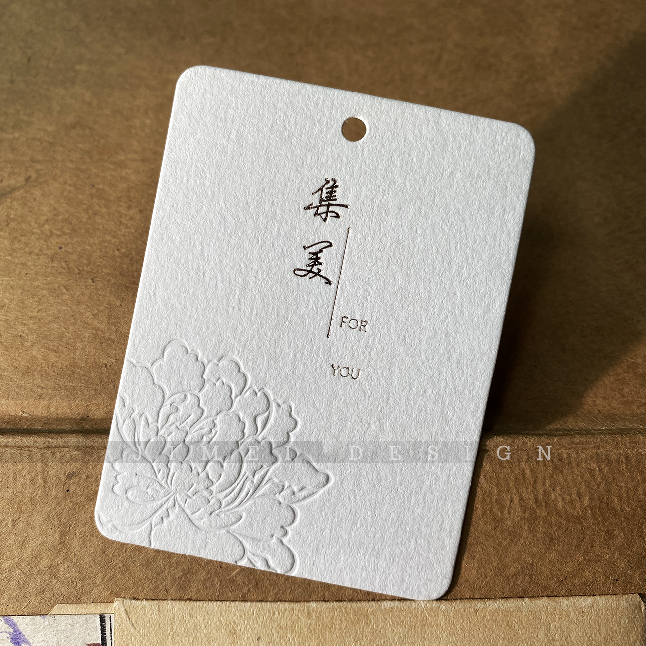 集美高档吊牌定做草香木棉纸凹凸logo定制男女装童装汉服内衣吊牌