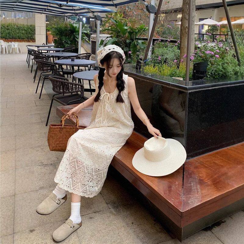 杏色镂空背心裙女夏季2025新款法式海边度假风沙滩裙无袖吊带长裙