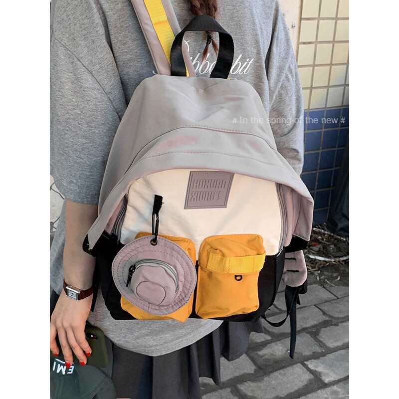 日本专柜韩版学院风休闲双肩包女式包2025新款撞色学生书包帆布旅