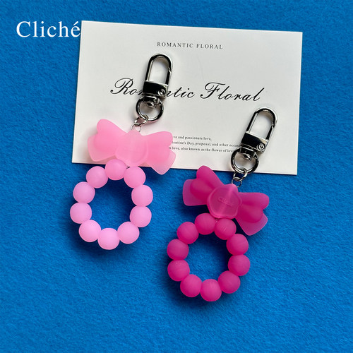 CLICHE果冻色蝴蝶结手机挂饰