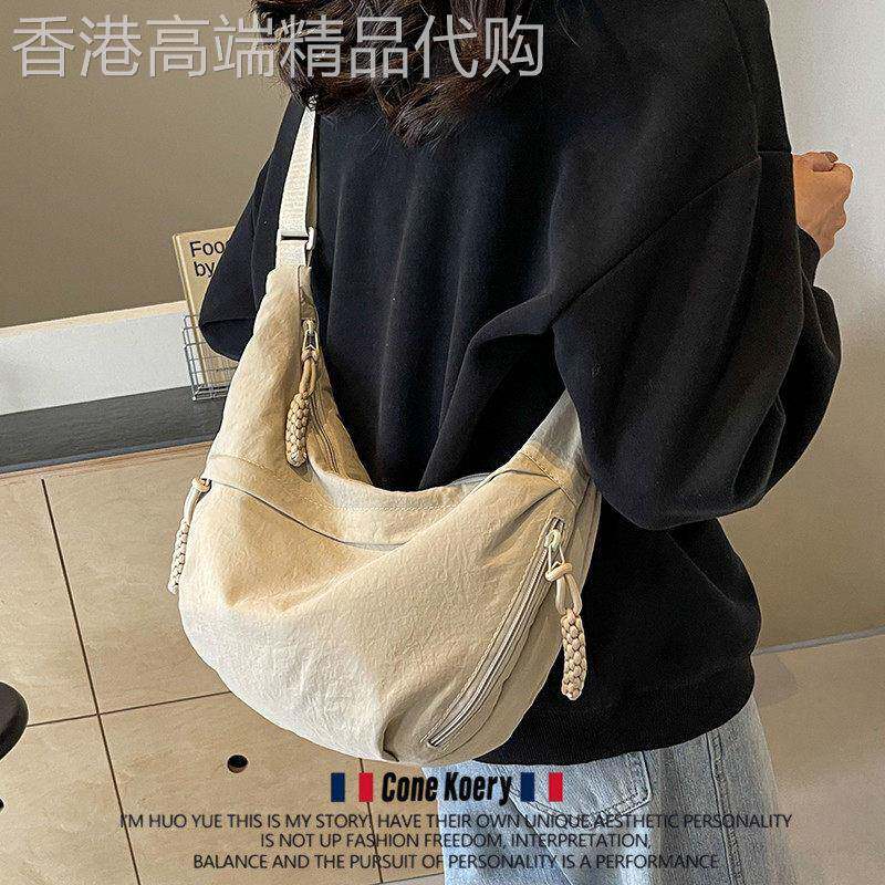 法国斜挎包饺子包包女式2025新款百搭休闲单肩背包大容量运动小包