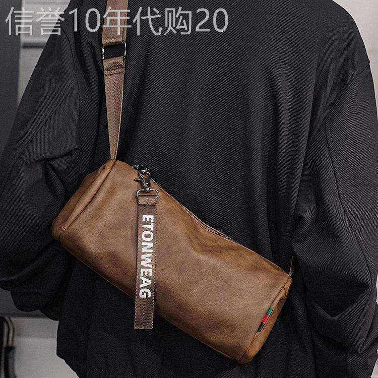 香港单肩包男休闲小跨包简约百搭软皮男包大容量圆筒包女斜挎包潮