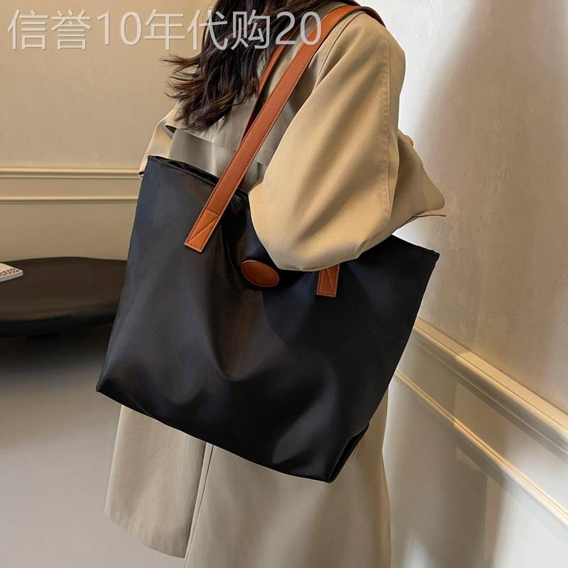 轻奢时尚尼龙包包女2026新款韩版简约单肩包休闲手提包防水帆布包