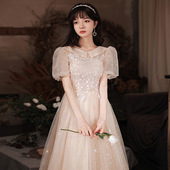 翻领晚礼服2026款 女声乐艺考香槟色气质学生年会活动主持人连衣裙