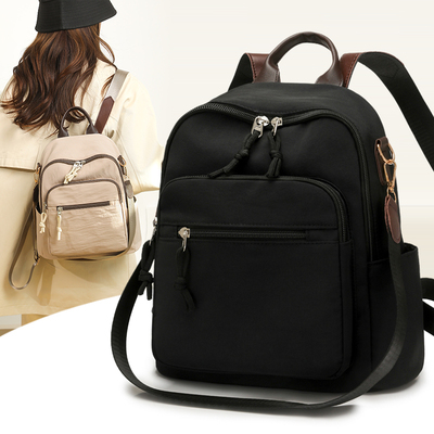 淘小奇多功能高颜值双肩包新款简约轻便防水大容量通勤女士斜挎包