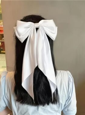 2 solid color ribbon bow hair clips in black and white, Kore