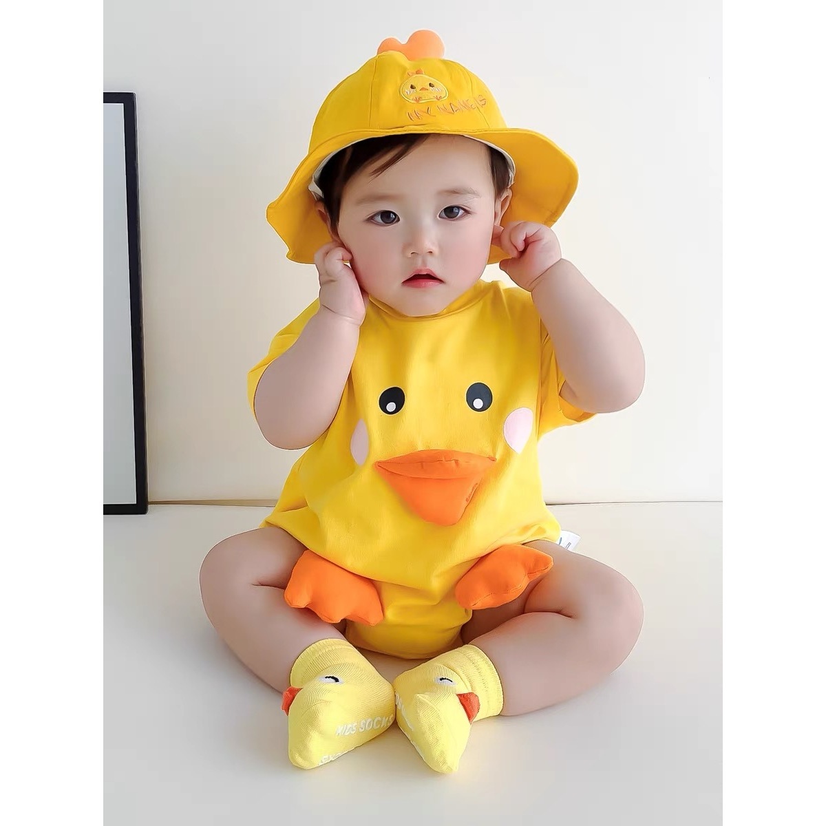 奥莱清仓婴幼儿包屁衣男女宝宝超萌可爱立体小黄鸭衣服薄款三角连