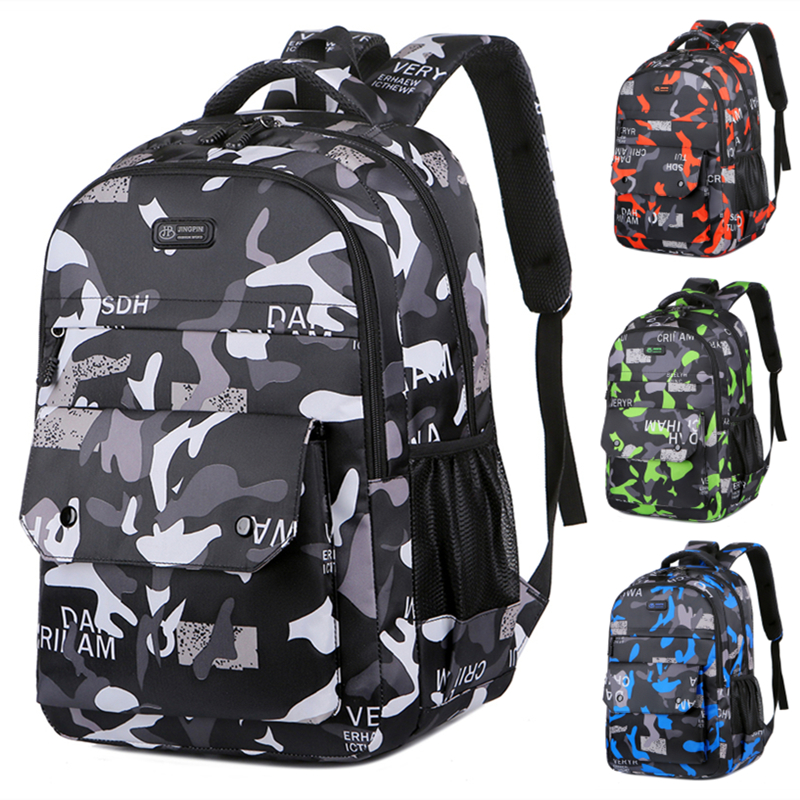 新款韩版小学生书包男孩三到六年级超轻减负大容量迷彩双肩包耐磨