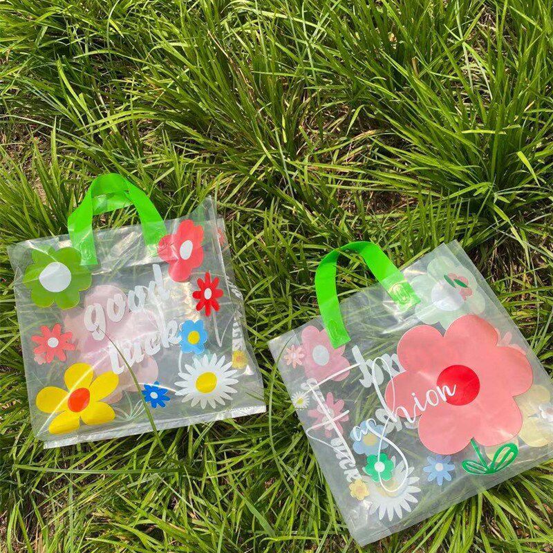泫雅花网红加厚塑料礼品手提袋子衣服装店包装购物V收纳袋透明商
