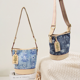 星际熊时尚百搭通勤休闲小众设计单肩斜挎包水桶包包