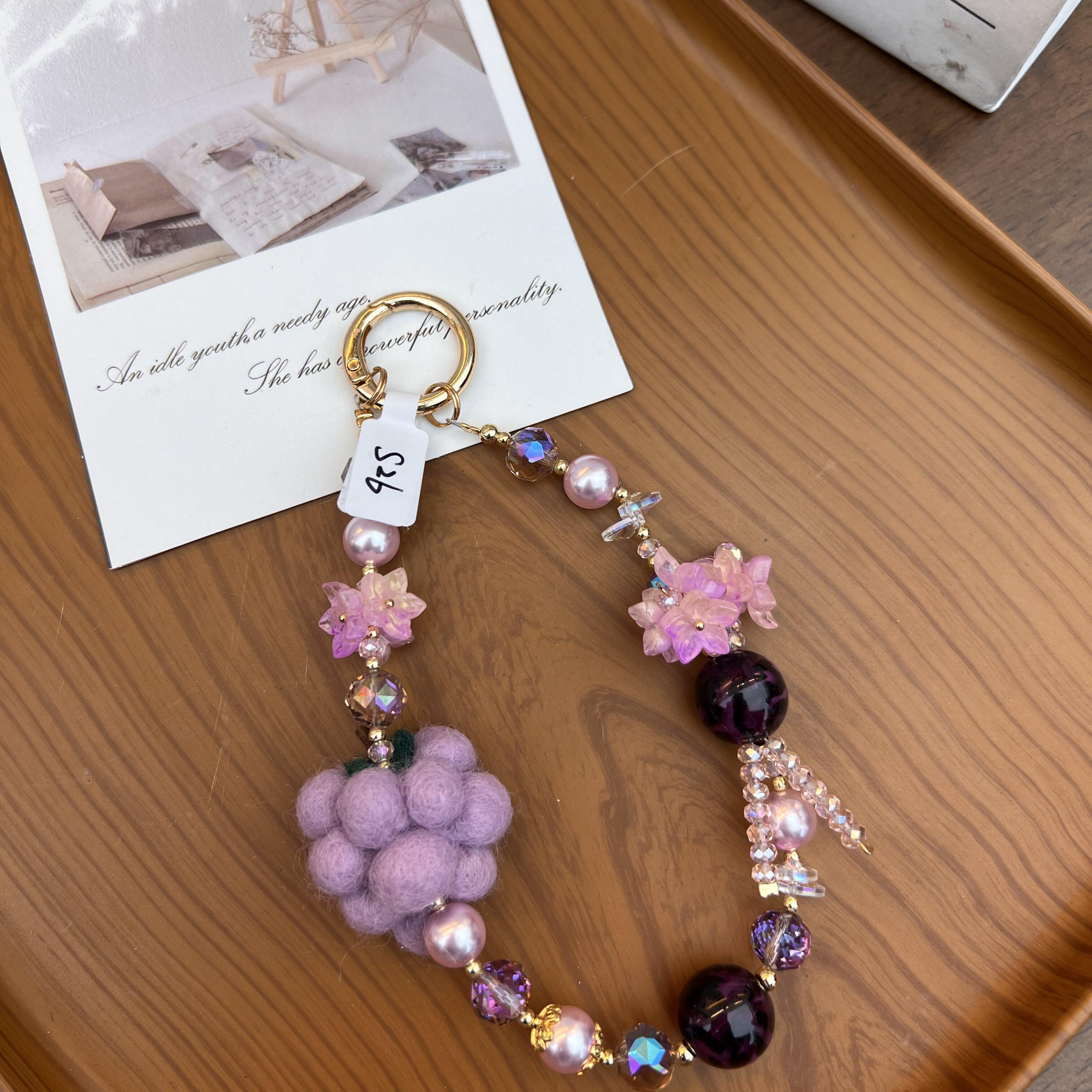 紫色串珠毛球手机挂件珠饰包挂相机挂链高级感通用挂绳包挂件可爱