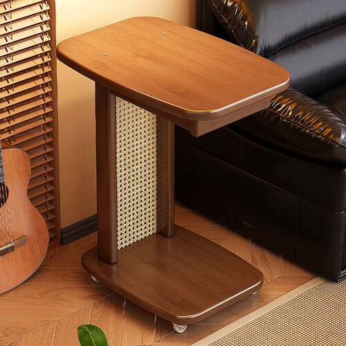 Small side table next the living room sofa apartment layout