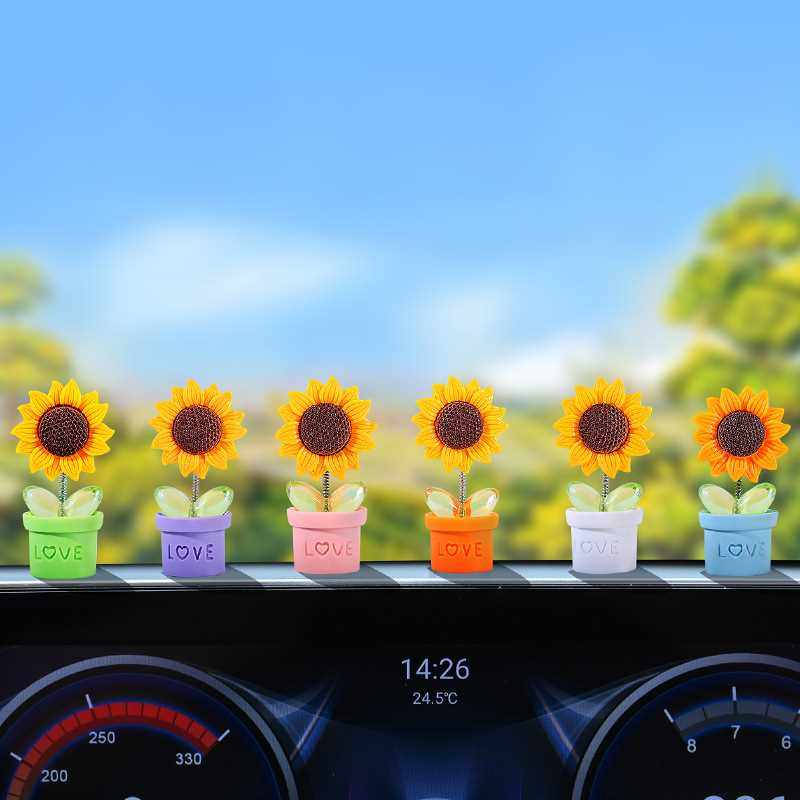 新款直销创意太阳花朵汽车摇头摆件车载中控仪表台网红摆件车内装