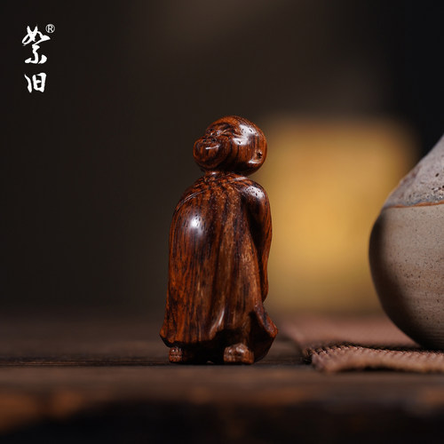 海南黄花梨小沙弥手把件