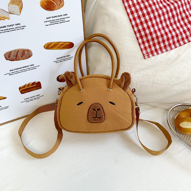 儿童包包可爱卡通女童斜挎出游小背包卡皮巴拉水豚零钱帆布手拎包