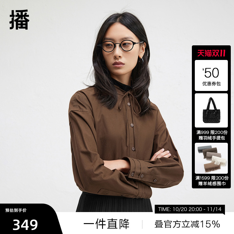 时髦串绳立领，袖口三层压褶设计