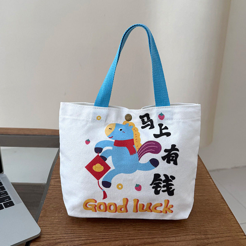新款休闲时尚帆布包新款甜美便当包外出零钱包妈咪包零食袋手拎包