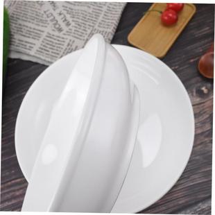 Plain white ceramic salad bowl deep soup plate chopped peppe