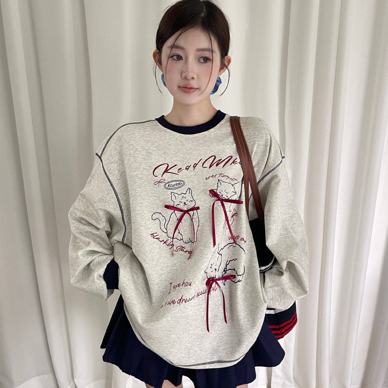 卡通猫咪印花蝴蝶结长袖卫衣女秋季设计感撞色宽松上衣