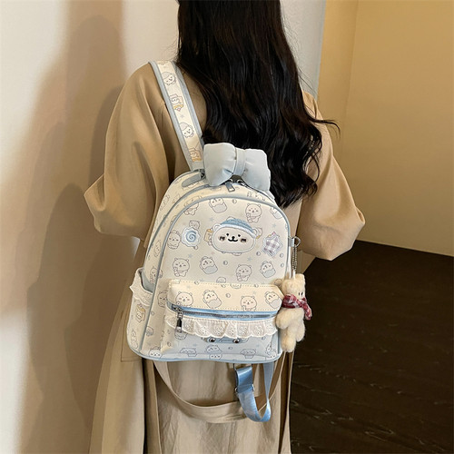 可爱小熊蝴蝶结双肩包女2026新款百搭通勤学生书包大容量旅游背包