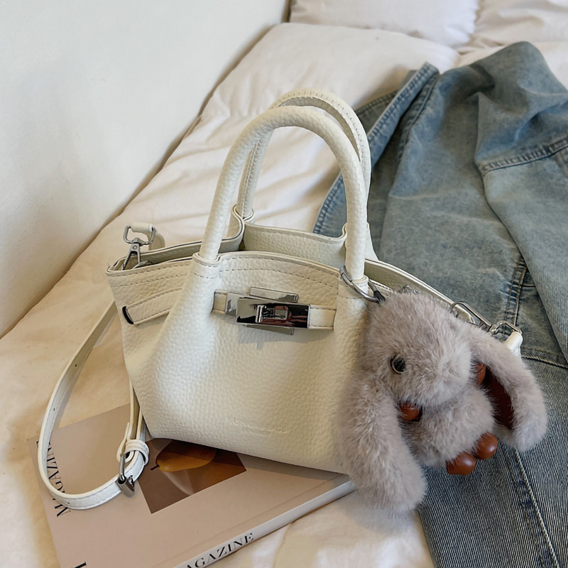 休闲复古手拎包包女式2026新款春季百搭单肩斜挎包上班手提水桶包,箱包皮具/热销女包/男包,水桶包,淘宝优惠券,粉丝福利购,淘宝优惠卷