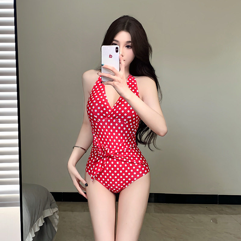 泳衣女款复古纯欲波点挂脖露背绑带比基尼连体三角度假海边装