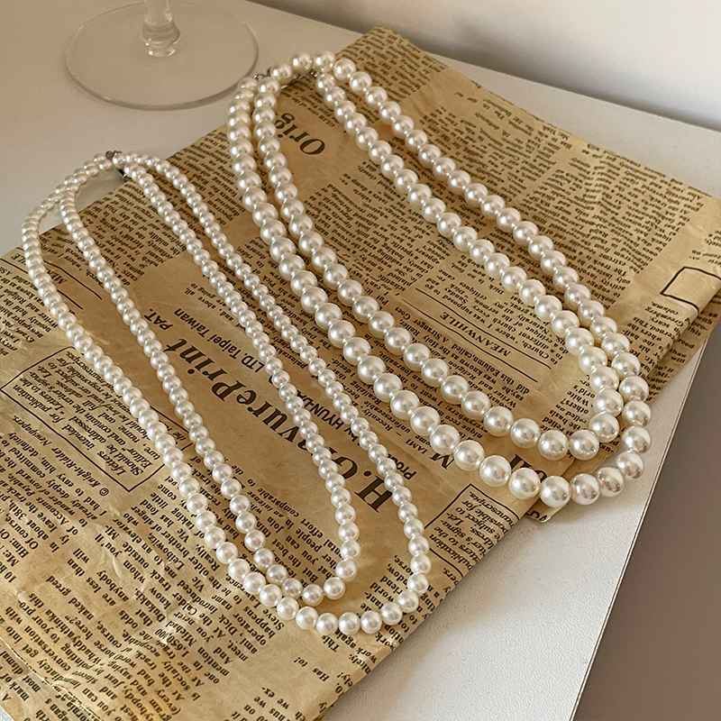 施家珍珠长款项链多种戴法