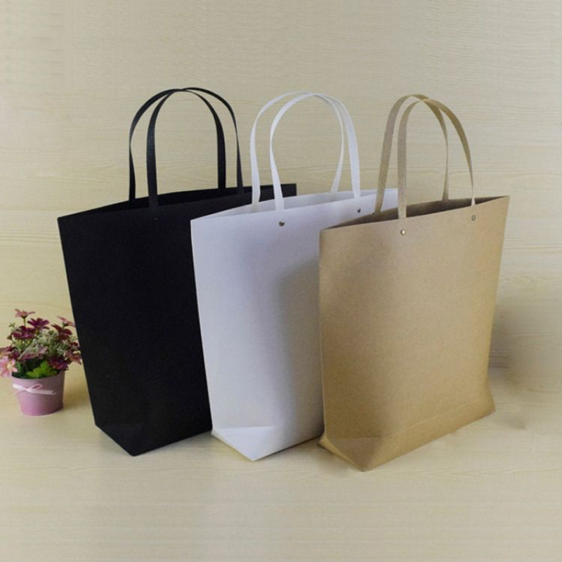 扁绳打柳钉超市手提袋韩版创意牛皮纸袋商场礼品包装袋