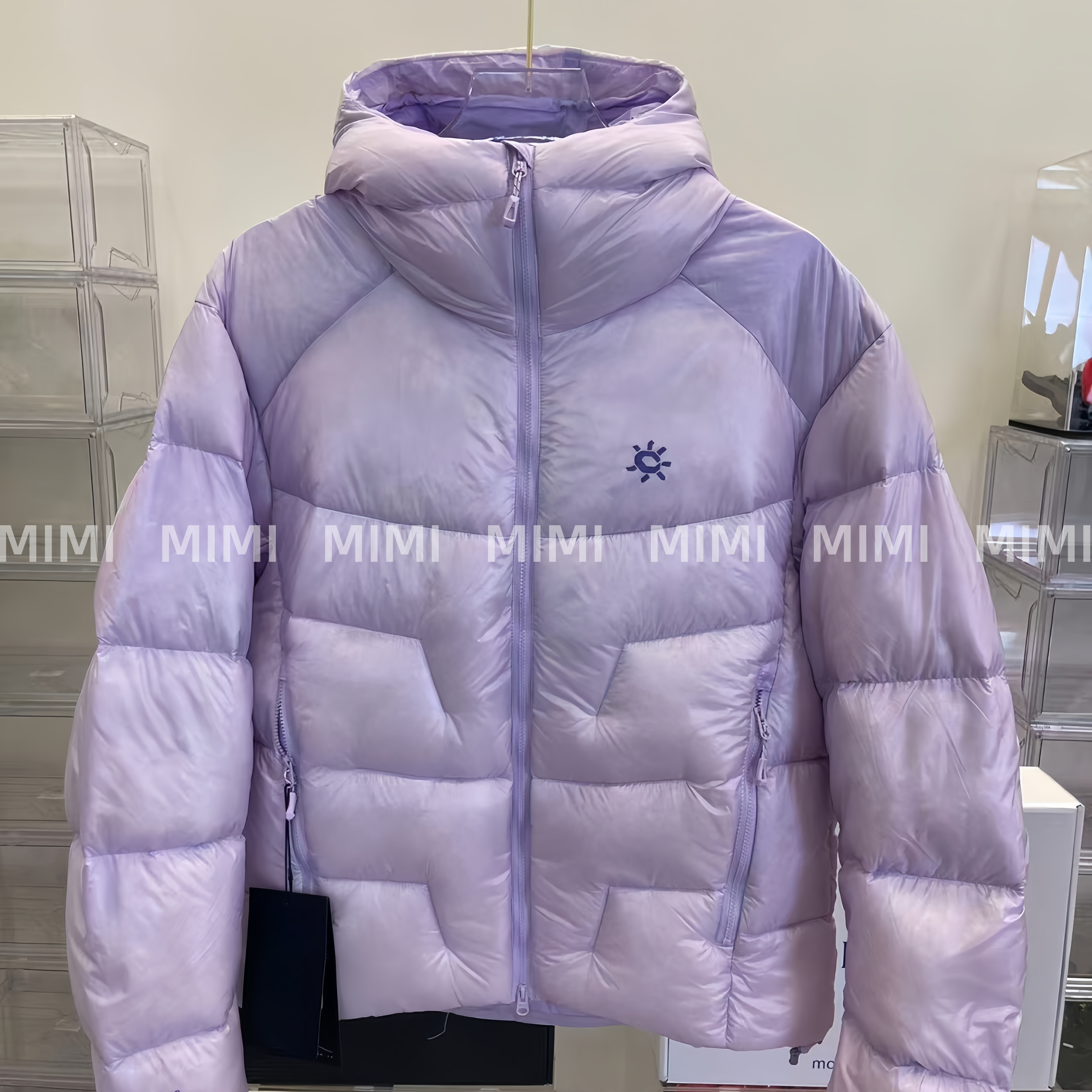 太阳石头凯5000GT玉雪粉羽绒服新