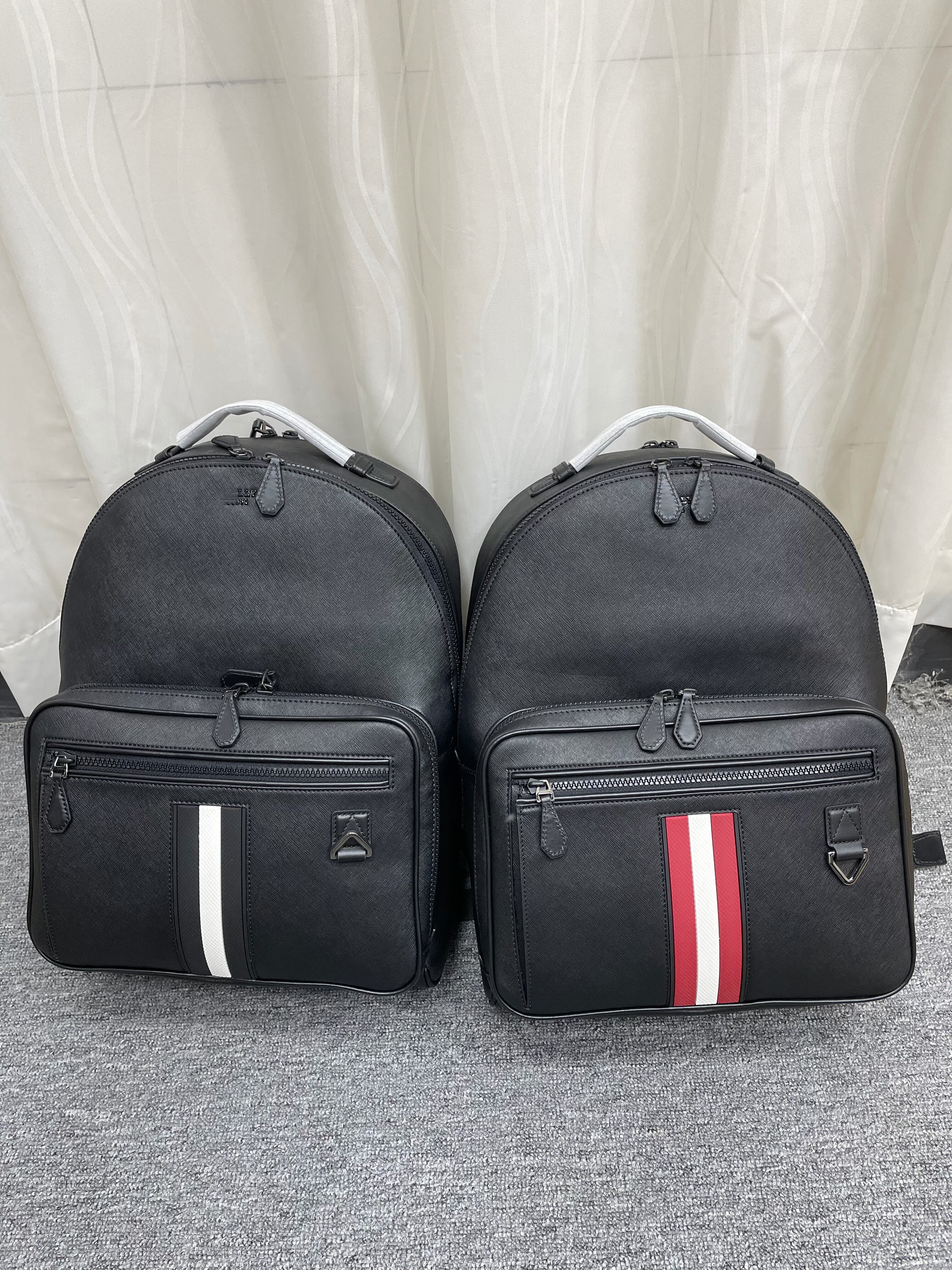 外贸原单男包背包真皮拉链条纹2025款经典百搭时尚休闲旅行双肩包