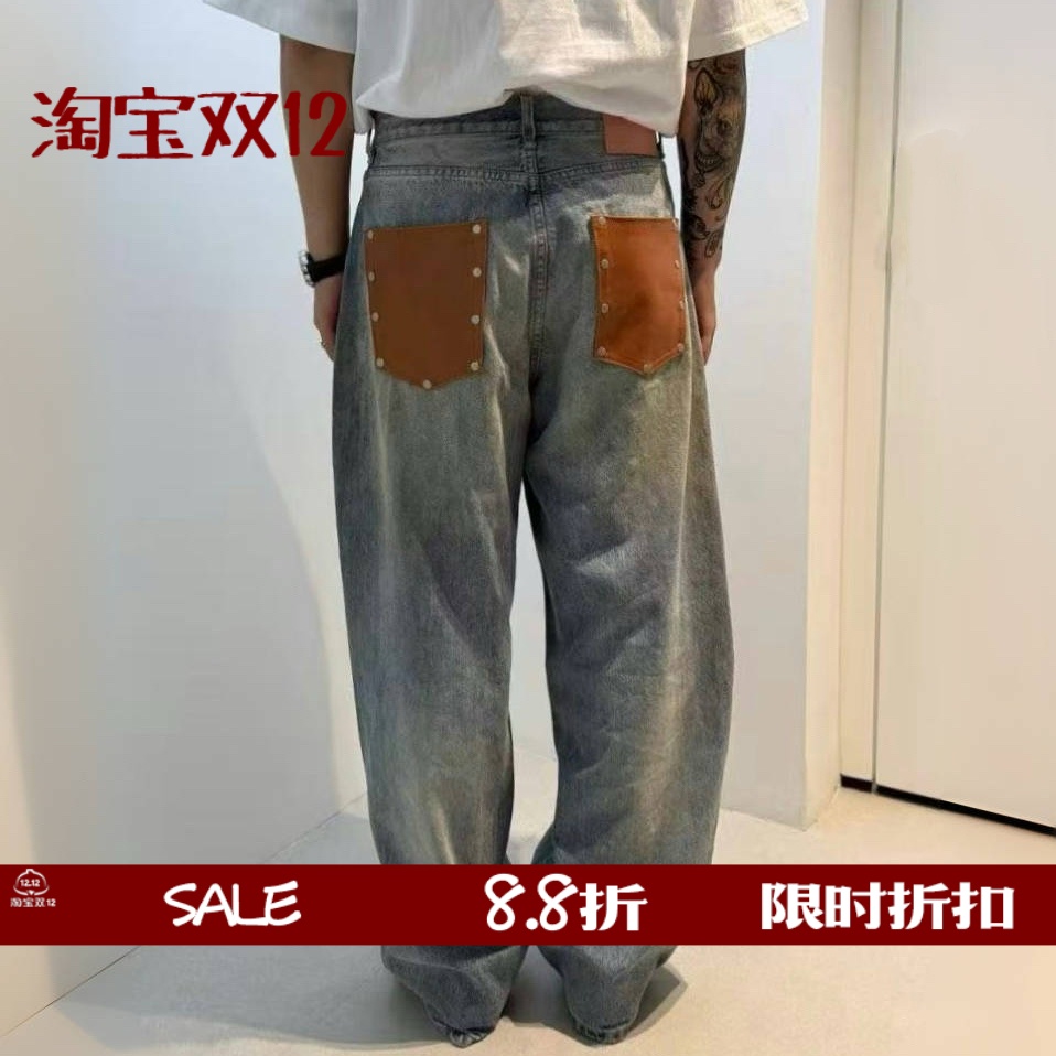 1981M泥染棕色皮牌铆钉牛仔裤