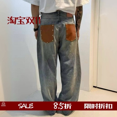 1981M泥染棕色皮牌铆钉牛仔裤