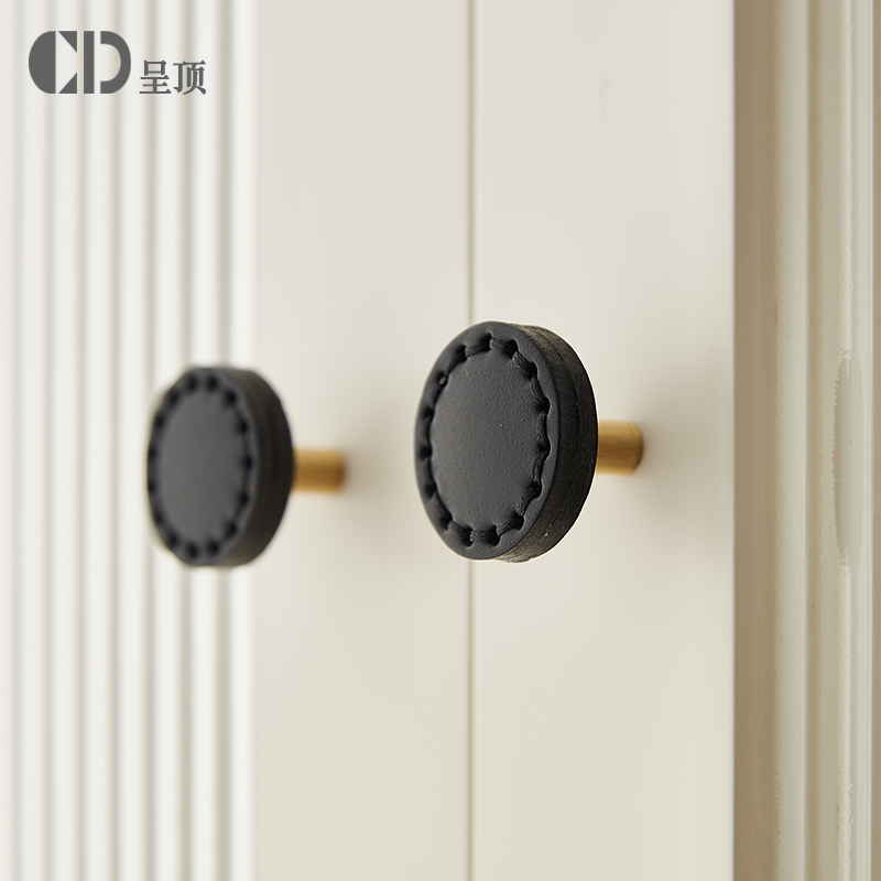 黄铜+牛皮柜门北欧拉手