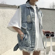 Mùa xuân của phụ nữ phiên bản Hàn Quốc của lỗ cá tính để làm cũ áo khoác denim lỏng lẻo - Áo vest