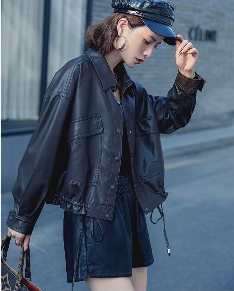 萱魅莎宽松版设计感短款皮衣