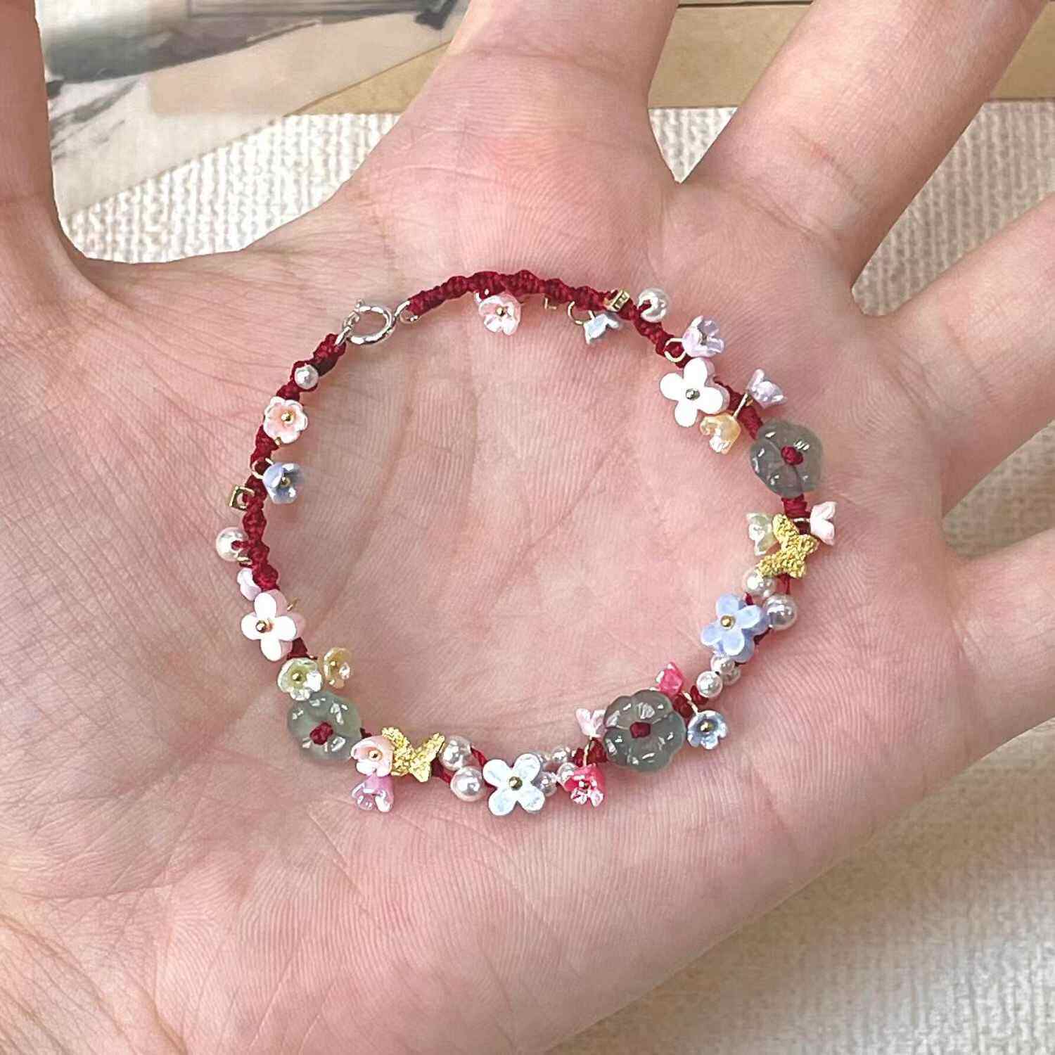 酒红色小花花蝴蝶编织手绳女简约显白花朵个性时尚百搭手链手饰品