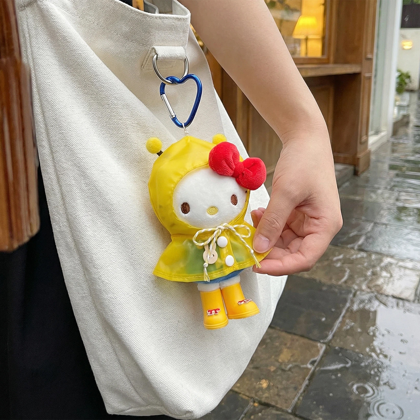 可爱正版HelloKitty雨衣套装毛绒包挂玩偶公仔背包挂饰kt猫凯蒂猫图片