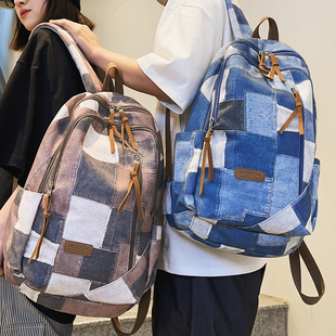 潮流帆布书包男生初中生大容量双肩包女旅游高中生大学生个性背包