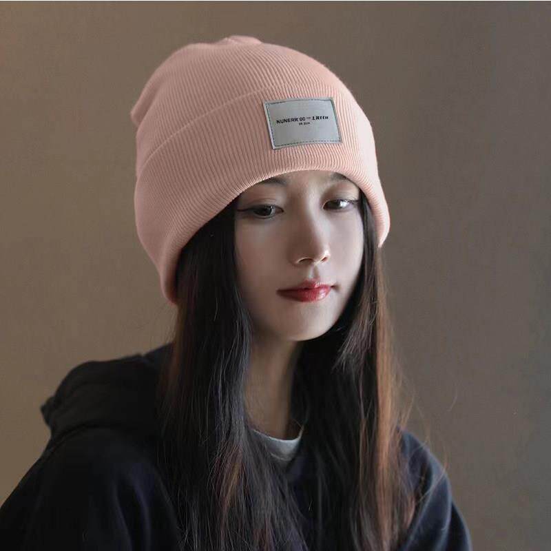 新款粉色防风保暖毛线帽女冬季时尚百搭针织加厚骑行显脸小帽子潮