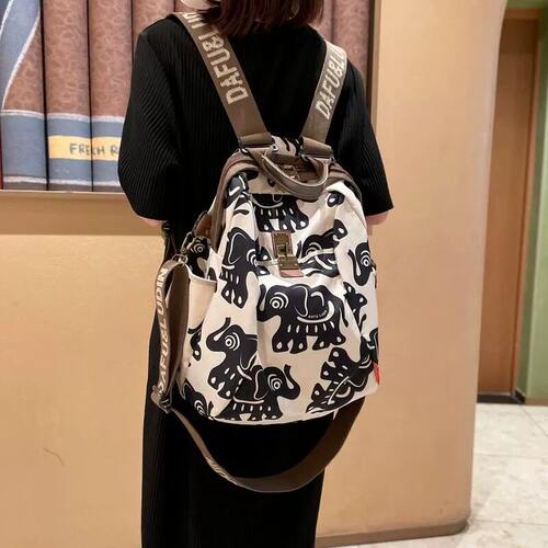 法国DUDK轻奢小吉象旅游双肩包女新款潮时尚旅行休闲户外笑脸背包