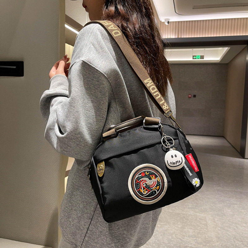 法国专柜MKDN百搭时尚包包女新款高级轻便单肩帆布包休闲斜挎女包