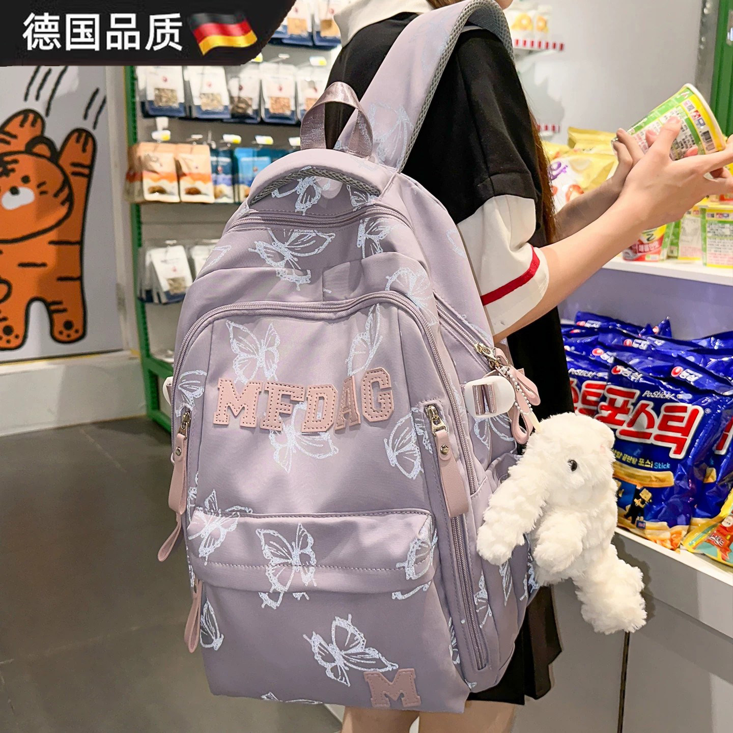 大容量初中生书包女高颜值时尚印花蝴蝶反光双肩包高中大学生背包