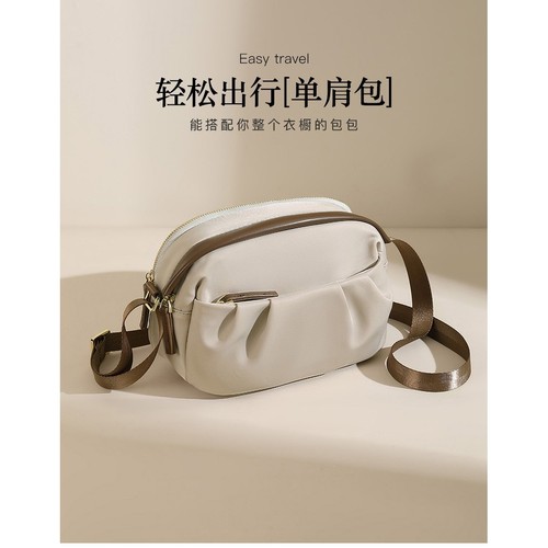 法国MK&ins帆布时尚斜挎包女士单肩小包牛津布休闲百搭纯色手机包